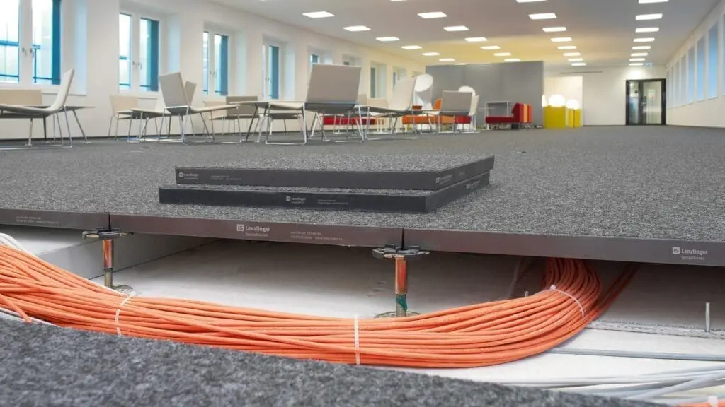 passage de câbles double plancher